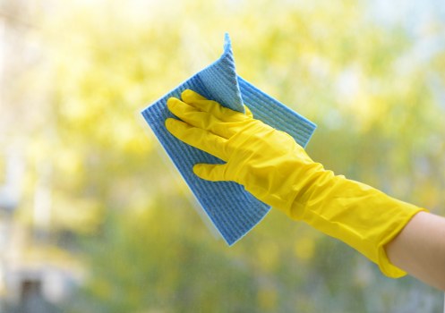 Fresh mattress cleaning setup with vacuum and bedding