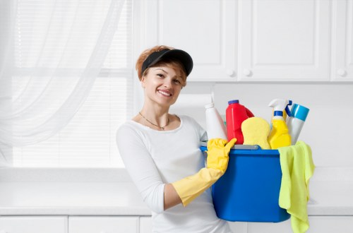 Airbnb cleaning service preparing a guest-ready rental living room